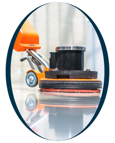 A oval shape frame and a man using an orange floor cleaning machine to clean a surface in a well-lit area.